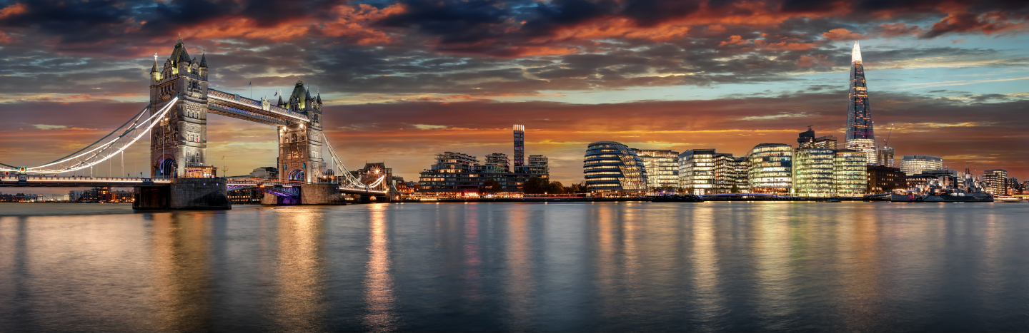 The modern skyline of London during sunset: from the Tower Bridge to London Bridge